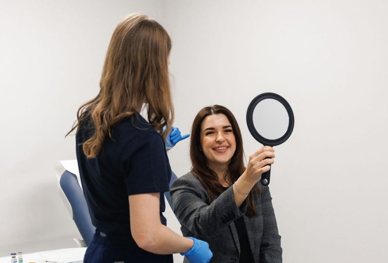 Patient Smiling while checking her face